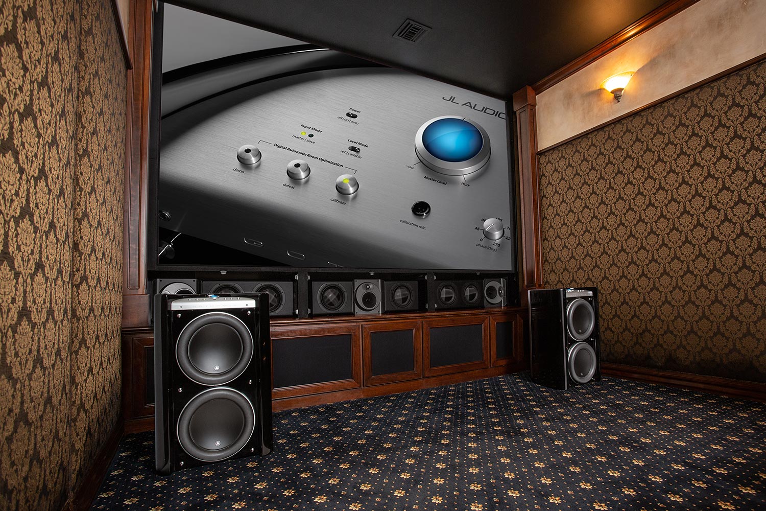 Home theater with dual subwoofers and a large screen showing an audio amplifier