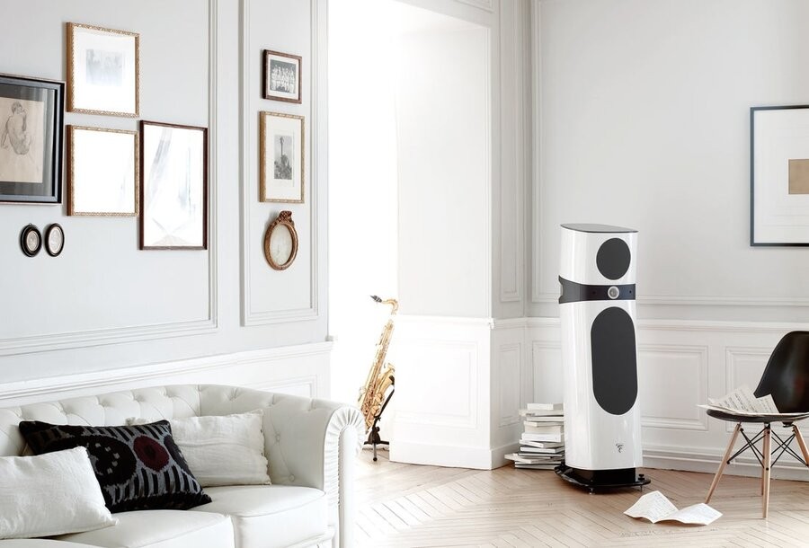 A Focal speaker installed by a Focal dealer in the corner of a living room or dedicated listening space.